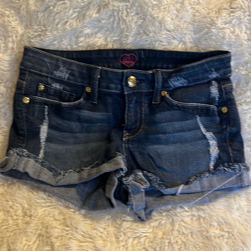 2b Bebe jean shorts. Hot pink silk pockets super cute! Size 27.